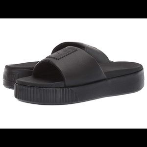 Puma Black platform slides size 7